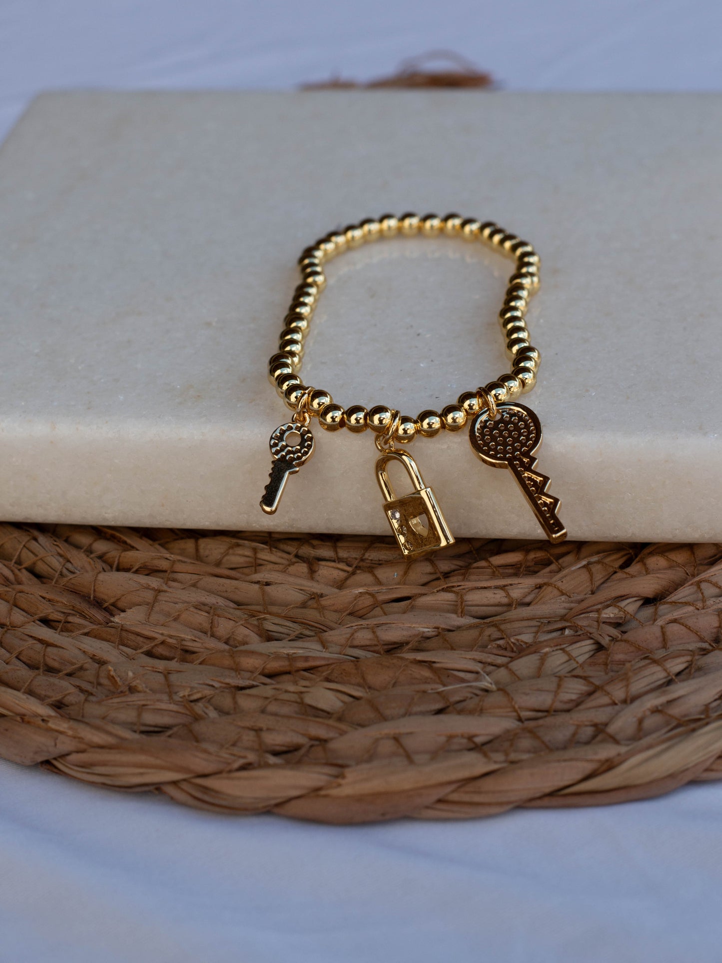 Pulsera key dorada